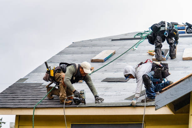 Professional Roofing technician working in Fiskeville, RI